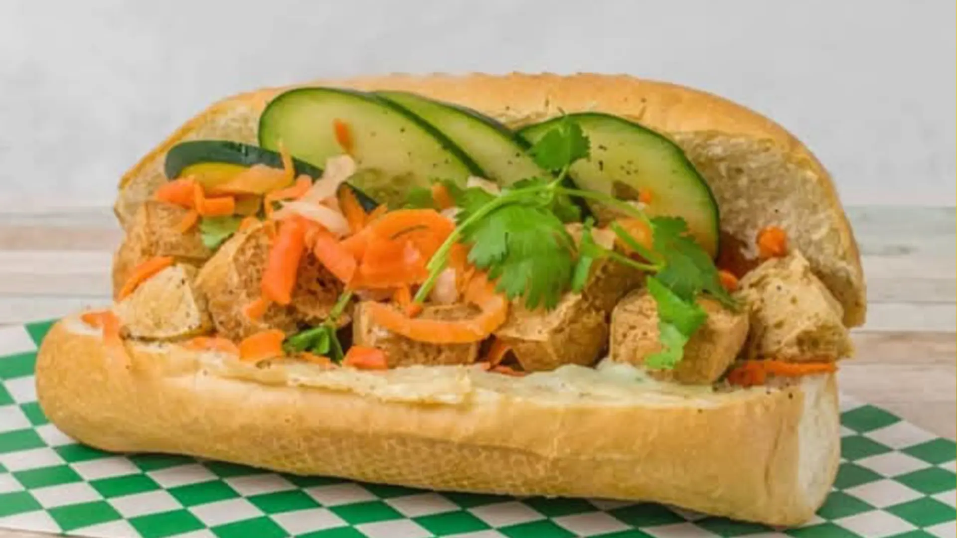 Fried tofu banh mi with veggies, cilantro at Big Boss Banh Mi, a Vietnamese Restaurant in Houston